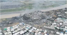  ?? ?? DISCARDED. A dump site where second-hand clothes are discarded at Old Fadama in Accra, Ghana.