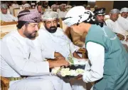  ?? (ONA) ?? H E Sheikh Khalid bin Omar al Marhoon (left) at the event