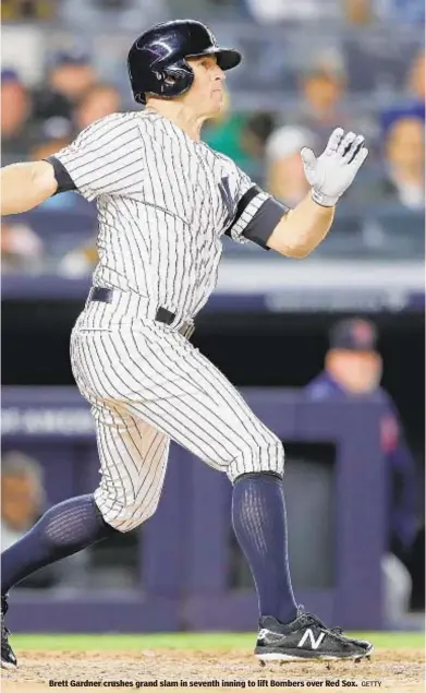  ?? GETTY ?? Brett Gardner crushes grand slam in seventh inning to lift Bombers over Red Sox.