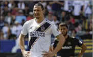  ?? LUIS SINCO / LOS ANGELES TIMES ?? Zlatan Ibrahimovi­c is a Malmo hero and one of Sweden’s greatest ever sports stars. But his hometown said he betrayed them when he bought his boyhood club’s biggest rivals in the Swedish league.