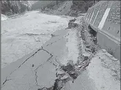  ??  ?? A damaged road due to the flood in the Sutlej in Kinnaur district in 2005. COUTESY:HP GOVT