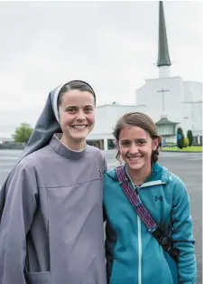  ?? Photos: Keith Heneghan ?? Left: Shopkeeper Bernie Byrne is doing a roaring trade in papal memorabili­a at his shop in Knock. Above: Sister Joan Kolbe and her sister, Paige Kolbe, from Nebraska, USA, visit the shrine on their tour of Ireland.