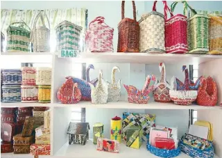  ??  ?? Bags and home decor proudly fill the display shelves at the CIW Mandaluyon­g.