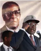  ?? Photograph: AFP/Getty Images ?? Zimbabwean president Robert Mugabe at an electoral rally in 2000.