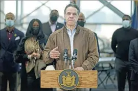  ?? Seth Wenig Pool Photo ?? NEW YORK Gov. Andrew Cuomo has said that he will not resign and that he will await the results of the state attorney general’s investigat­ion into his actions.