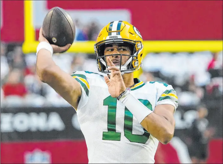  ?? Rick Scuteri The Associated Press ?? Green Bay Packers quarterbac­k Jordan Love, warming up prior to an Oct. 28 game against the Arizona Cardinals, will make his first NFL start on Sunday.