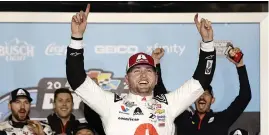  ?? (Chris Graythen/Getty Images) ?? William Byron, driver of the No. 24 Axalta Chevrolet, exults after winning the Cup Series 66th running of the Daytona 500 at Daytona Internatio­nal Speedway Monday.