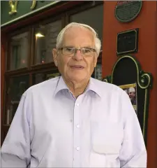  ??  ?? Seán Ó Sé outside the pub owned by the man who made Dan Paddy Andy famous beyond the county bounds, John B’s.