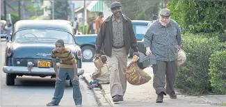  ??  ?? Denzel Washington stars as Troy Maxson and Viola Davis plays Rose Maxson in Fences