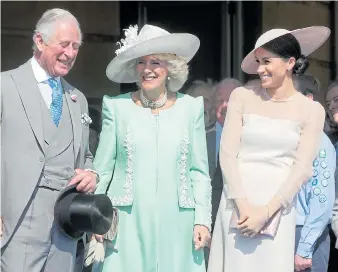  ??  ?? Meghan lets Prince Charles in on the joke with a laughing Camilla and, right, with Harry