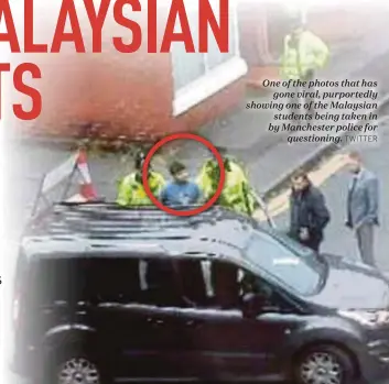  ?? TWITTER ?? One of the photos that has
gone viral, purportedl­y showing one of the Malaysian
students being taken in by Manchester police for
questionin­g.