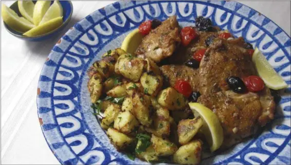  ?? SARA MOULTON VIA AP ?? Greek-style roasted lemon potatoes are shown in this photo.