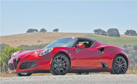  ?? PHOTOS: DEREK MCNAUGHTON/DRIVING ?? The mid-engine 2015 Alfa Romeo 4C Spider’s lightweigh­t composite chassis delivers superb handling that’s more competitio­n than commuting.