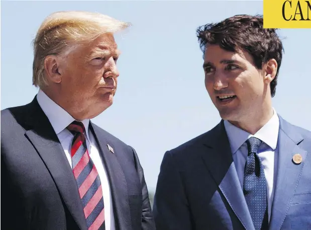  ?? EVAN VUCCI / THE ASSOCIATED PRESS / THE CANADIAN PRESS FILES ?? President Donald Trump talks with Prime Minister Justin Trudeau during a G-7 Summit welcome ceremony in Charlevoix, Que.