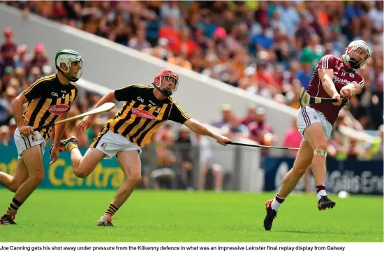  ??  ?? Joe Canning gets his shot away under pressure from the Kilkenny defence in what was an impressive Leinster final replay display from Galway