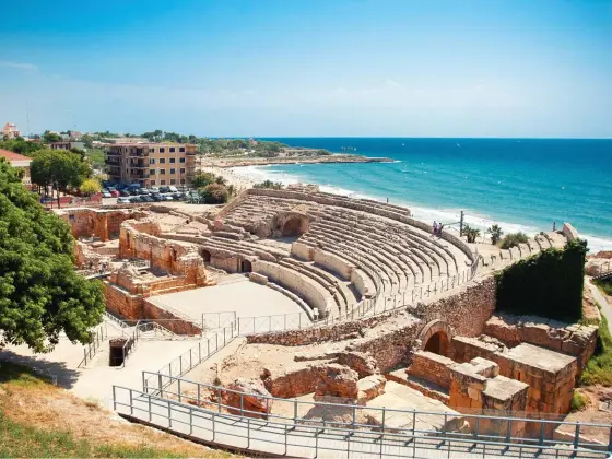  ??  ?? ABOVE: The Tarragona Amphitheat­re overlooks the Mediterran­ean Sea in the Catalonia region of northeast Spain. Built in the 2nd century AD by the Romans, the popular venue hosted gladiator games. OPPOSITE: The ancient Roman goldmines at Las Médulas, once revered as the largest in the Roman Empire, have become a nature park popular for hikers and sightseein­g. In 1997 UNESCO designated the scenic area as a World Heritage Site. Tourist Office of Spain