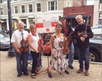  ?? Contribute­d photo ?? The Nightingal­e Fiddlers are ready to resume playing in public.