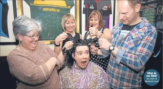  ??  ?? Gillian Millman has her head shaved at Arbroath’s Millgate Bar to raise funds for the Scottish Associatio­n for Mental Health in appreciati­on of the help they offer to troubled individual­s who try to take their own life, as her daughter Lauren, left,...