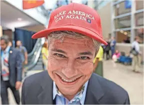 ?? MIKE DE SISTI, USA TODAY NETWORK ?? Ed Greenleaf, a South Carolina delegate, shows off his “Make America Gay Again” hat.