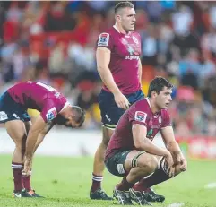  ??  ?? GUTTED AGAIN: Reds players look on after losing the round 10 Super Rugby match against the Waratahs at Suncorp Stadium.