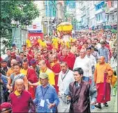  ?? COURTESY: WANG CHEN ?? Buddhist monks and residents during a rally in state capital Gangtok.