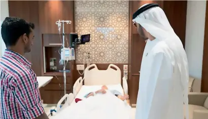  ?? Supplied photo ?? Sheikh Mohamed bin Zayed during his visit to Mullappall­i Ali at the Cleveland Clinic Abu Dhabi on Thursday. —
