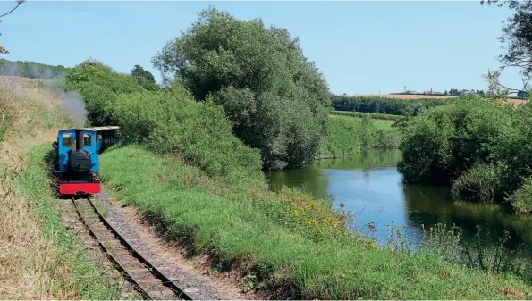  ?? HLR ?? Services have resumed on Northumber­land’s 15in gauge Heathersla­w Light Railway. Alan Keef 2-6-0TT Bunty is seen running alongside the River Till.