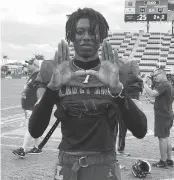 ?? DAVID WILSON dbwilson@miamiheral­d.com ?? Cormani McClain flashed the ‘U’ sign after winning the Class 4S title with Lakeland last month. The 5-star cornerback is the No. 2 overall prospect in the 247 composite rankings for the Class of 2023.