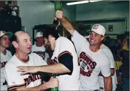  ?? ERIC RISBERG — THE ASSOCIATED PRESS, 1989 ?? Norm Sherry, left, whose suggestion to Los Angeles Dodgers teammate Sandy Koufax helped cultivate the future Hall of Fame pitcher’s potential, has died. He was 89. Sherry died Monday of natural causes at an assisted living facility in San Juan Capistrano, his son Mike told The Associated Press on Wednesday.