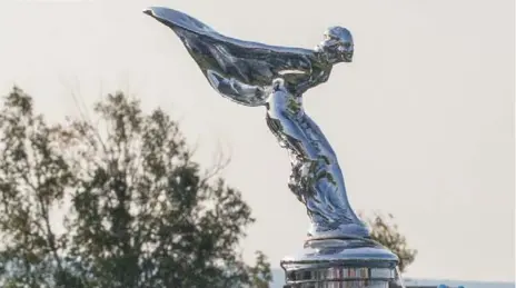  ?? GERRY MALLOY FOR THE TORONTO STAR ?? The Rolls-Royce mascot, the Spirit of Ecstasy, started life as The Whisper, emblematic of an affair between a model and the car’s owner.