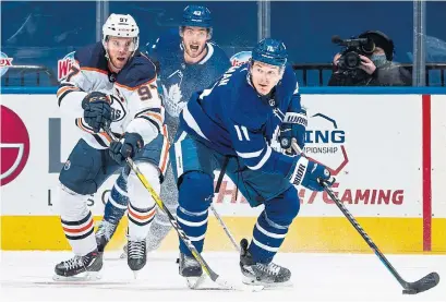  ?? MARK BLINCH GETTY IMAGES ?? Oilers centre Connor McDavid won’t have to play against Zach Hyman anymore, after Hyman joined him in Edmonton.