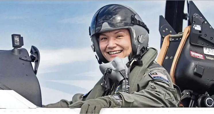  ??  ?? Yapp quit her law studies and applied to join the RMAF to pursue her dreams of becoming a pilot. — CHAN TAK KONG/The Star