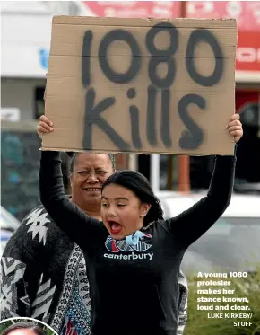  ?? LUKE KIRKEBY/ STUFF ?? A young 1080 protester makes her stance known, loud and clear.