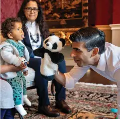  ?? ?? Tough audience: Rishi Sunak woos families at the Treasury