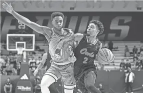  ?? TROY TAORMINA/USA TODAY SPORTS ?? Florida Atlantic guard Nick Boyd (2) drives with the ball as Rice guard Noah Shelby (1) defends during the first half Wednesday at Tudor Fieldhouse.