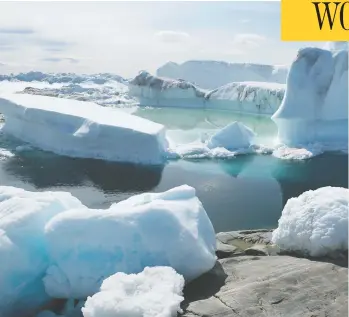  ?? SEAN GALLUP / GETTY IMAGES ?? Icebergs jam the Ilulissat Icefjord near Ilulissat, Greenland, during a spell of unseasonab­ly warm weather on Tuesday, as the heat wave that recently sent temperatur­es to record levels in Europe has moved north to Greenland.