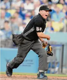  ?? Keith Birmingham / Pasadena Star-News via Getty Images ?? Dan Iassogna is the crew chief for the seven umpires working the World Series. It’s his third time to work the Fall Classic.