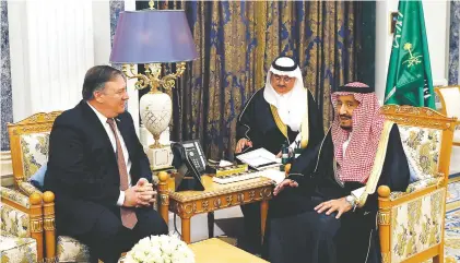  ?? AP PHOTO BY LEAH MILLIS ?? U.S. Secretary of State Mike Pompeo, left, meets Tuesday with Saudi Arabia’s King Salman in Riyadh, Saudi Arabia. The two met over the disappeara­nce of Saudi writer Jamal Khashoggi, who vanished two weeks ago during a visit to the Saudi Consulate in Istanbul.