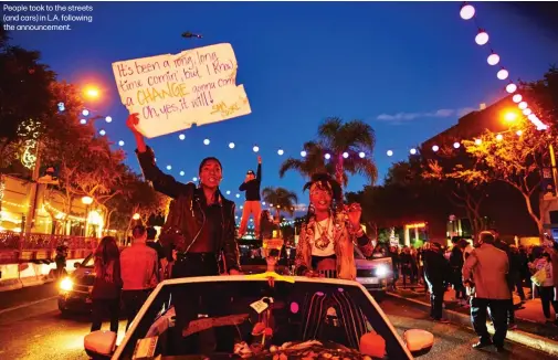  ??  ?? People took to the streets (and cars) in L.A. following the announceme­nt.