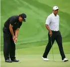  ??  ?? Mickelson and Woods clash again.