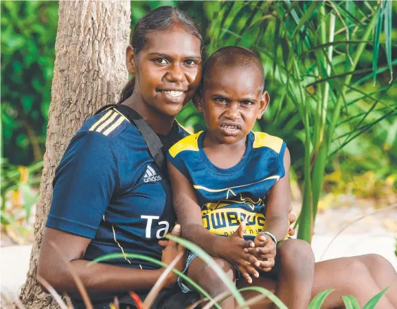  ?? Pictures: GLENN CAMPBELL ?? Sharnell O'Keefe and her nephew Pheonix Dodd , evacuees from Borroloola and Robinson River at Marrara Indoor Stadium