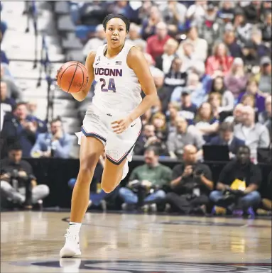  ?? Jessica Hill / Associated Press ?? UConn’s Napheesa Collier was named the AAC tournament’s Most Outstandin­g Player, leading the Huskies to a 66-45 win over UCF on Monday night. Collier finished the game with 25 points, 14 rebounds and three assists.