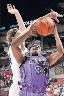  ?? [BARBARA J. PERENIC/DISPATCH] ?? Leah Morrow of Africentri­c gets to a rebound before Sydney Diedrich of Gilmour Academy in a Division III state semifinal.