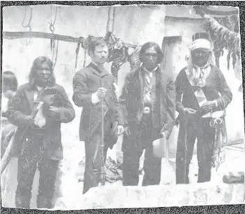  ?? COURTESY OF THE NM MUSEUM OF HISTORY ?? Gov. Solomon Bibo with the Acoma Pueblo Tribal Council in a photograph that appears in the documentar­y film “Challah Rising in the Desert.” Bibo was one of several brothers from a Jewish family in Germany who came to New Mexico and traded with various...