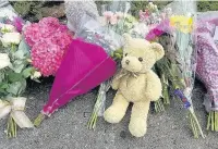  ??  ?? Floral tributes left in Heolgerrig, Merthyr Tydfil, after the death of Pearl Melody Black, right