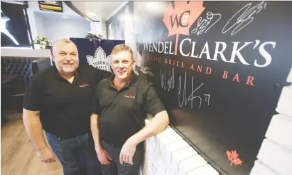  ?? MORGAN MODJESKI ?? Byron Kidd, right, and Gary Baba, two of the four owners of Wendel Clark's Classic Grill and Bar said COVID-19 changed the game.