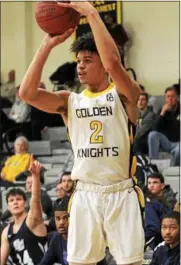  ?? COLLEGE OF ST. ROSE/ EUGENE DEVILAMIL ?? College of St. Rose freshman and Saratoga Springs grad Adam Anderson goes up for a jump shot earlier this season for the Golden Knights.