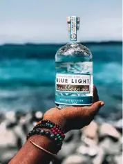  ?? COURTESY OF BLUE LIGHT GIN ?? Blue Light Gin in Grenada is among several Caribbean distillers that are now making hand sanitizers in the fight against the coronaviru­s.