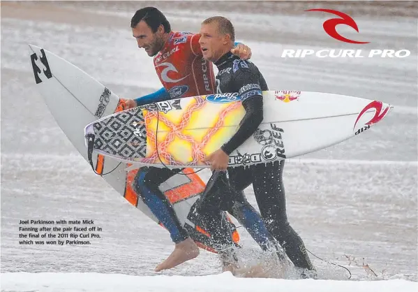  ??  ?? Joel Parkinson with mate Mick Fanning after the pair faced off in the final of the 2011 Rip Curl Pro, which was won by Parkinson.