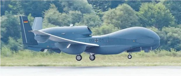  ?? ARMIN WEIGEL / AFP / GETTY IMAGES FILES ?? The German government has confirmed it is trying to sell to Canada an unmanned Euro Hawk aircraft, such as this one. But some analysts say the drone “would hardly be able to fly” and is worth little more than “scrap value.”